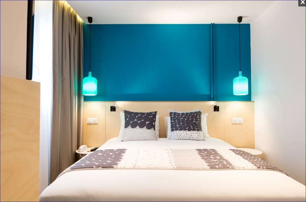 Hotel La Regence Courbevoie Camera foto